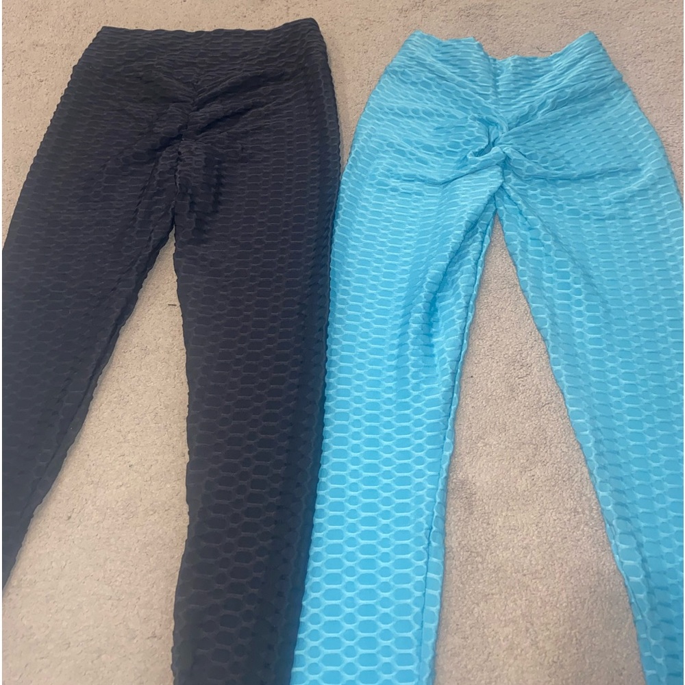 Never worn 2 pair of Woman’s shape enhancing leggings